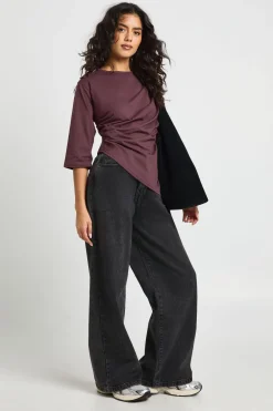 T-shirt à ourlet asymétrique, taille cintrée, manches 3/4