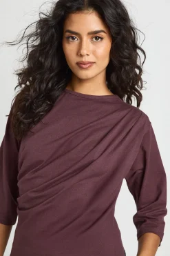 T-shirt à ourlet asymétrique, taille cintrée, manches 3/4