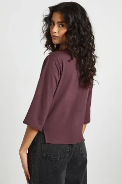 T-shirt à ourlet asymétrique, taille cintrée, manches 3/4
