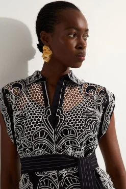 Tunique tissée en coton à broderie et motifs découpés