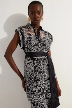 Tunique tissée en coton à broderie et motifs découpés