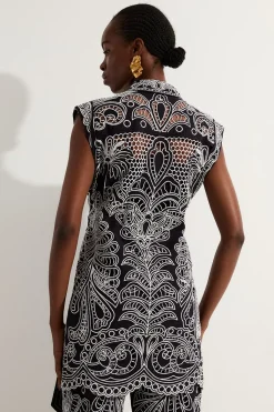 Tunique tissée en coton à broderie et motifs découpés
