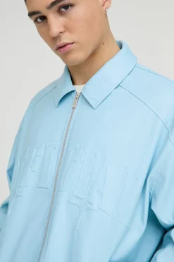 Veste bomber collard surdimensionnée officielle en synthétique embossé