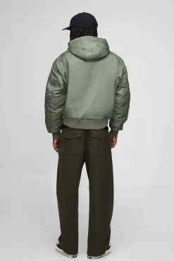 Veste bomber en nylon à capuche, à la coupe ample et ourlet incurvé