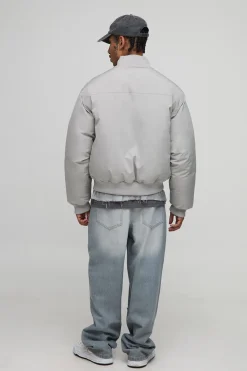 Veste bomber en nylon peached avec détails de couture surdimensionnés