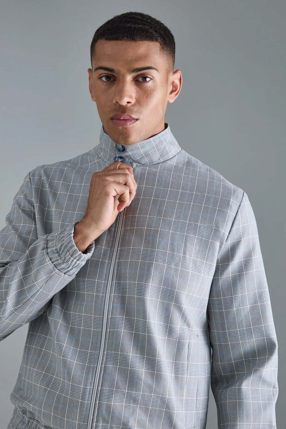 Veste bomber élégante à carreaux, à col montant et à fermeture éclair