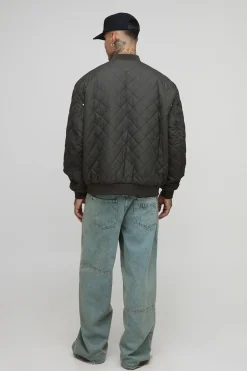 Veste bomber matelassée haute, avec poche de style charpentier, coupe régulière