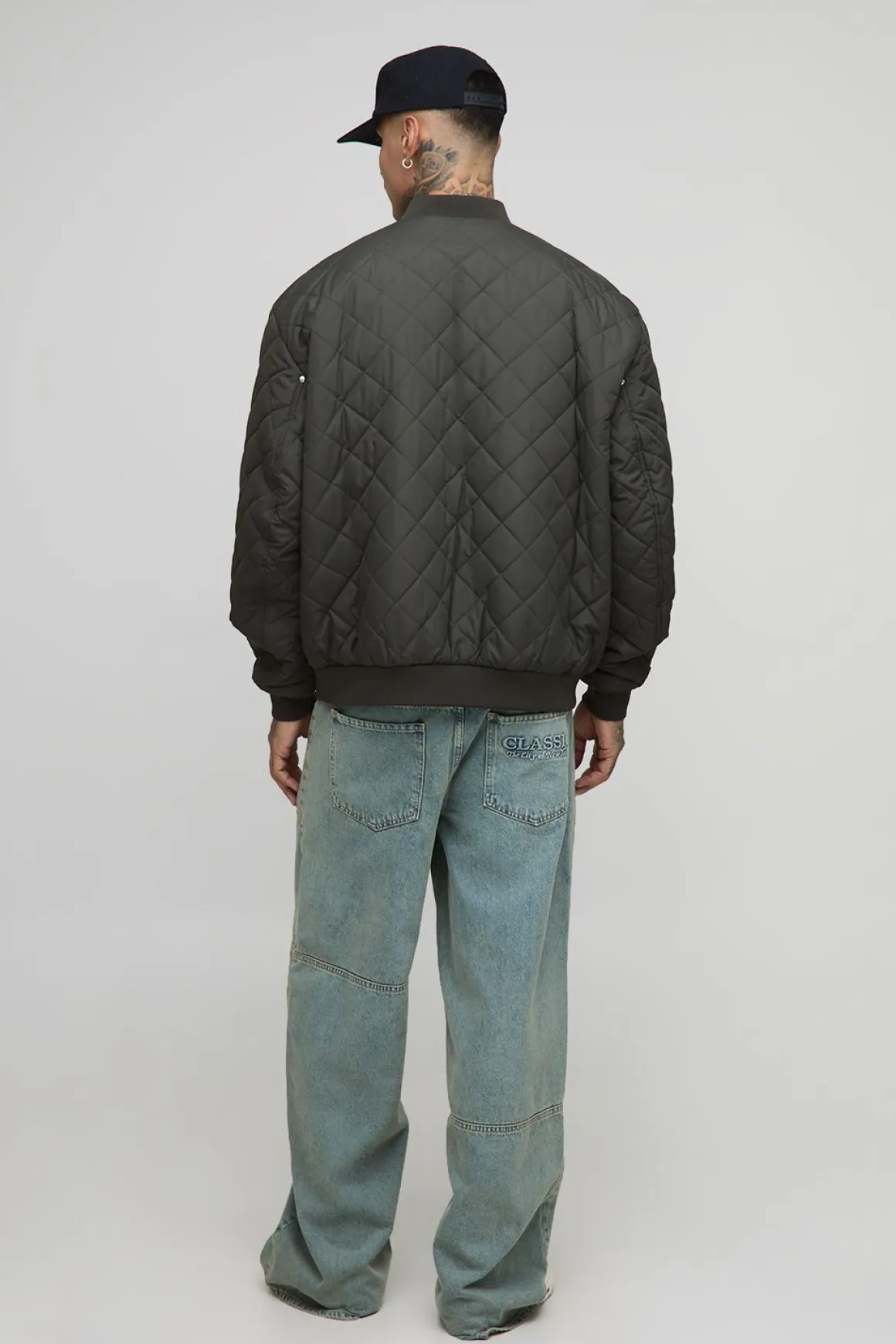 Veste bomber matelassée haute, avec poche de style charpentier, coupe régulière