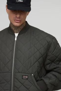 Veste bomber matelassée haute, avec poche de style charpentier, coupe régulière
