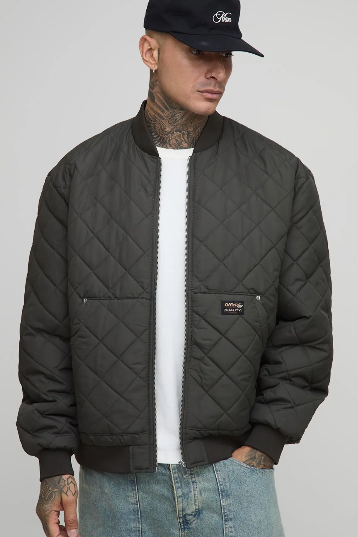 Veste bomber matelassée haute, avec poche de style charpentier, coupe régulière