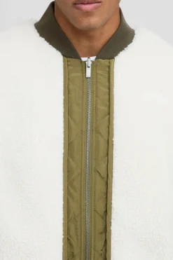 Veste bomber matelassée réversible à panneaux en nylon, coupe ample, version synthétique