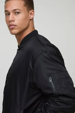 Veste bomber noire haute, rembourrée et à panneaux en nylon