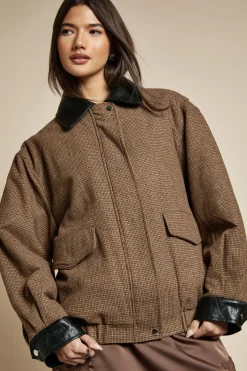 Veste bomber surdimensionnée à l'aspect laine et à motif à carreaux