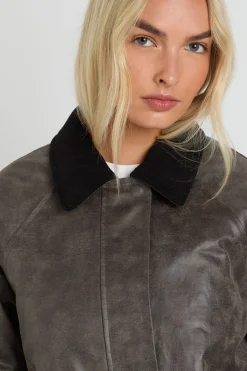 Veste à col avec couture contrastante et aspect suédé