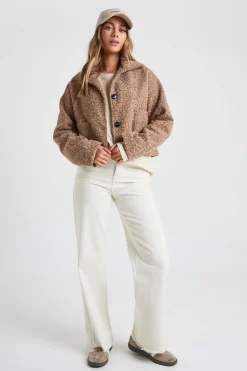 Veste à col boutonné à l'aspect laine avec détail de poche