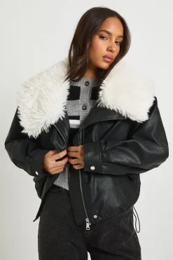 Veste courte en synthétique à col de fourrure