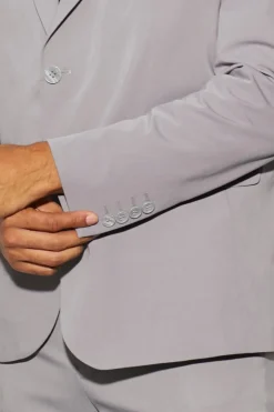 Veste de costume oversize, à la coupe carrée et à simple boutonnage