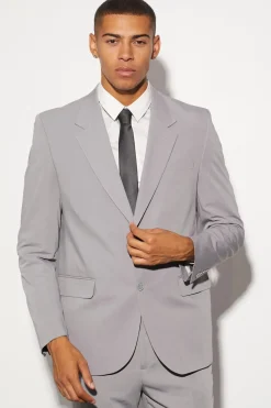 Veste de costume oversize, à la coupe carrée et à simple boutonnage