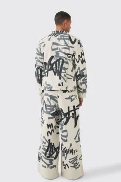 boohooMAN Veste de Motard en Denim Coupe Boxy Slim avec Impression Laser Graffiti<Homme Denim|Denim