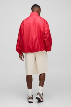 Veste de survêtement oversize à col tunnel haute brillance