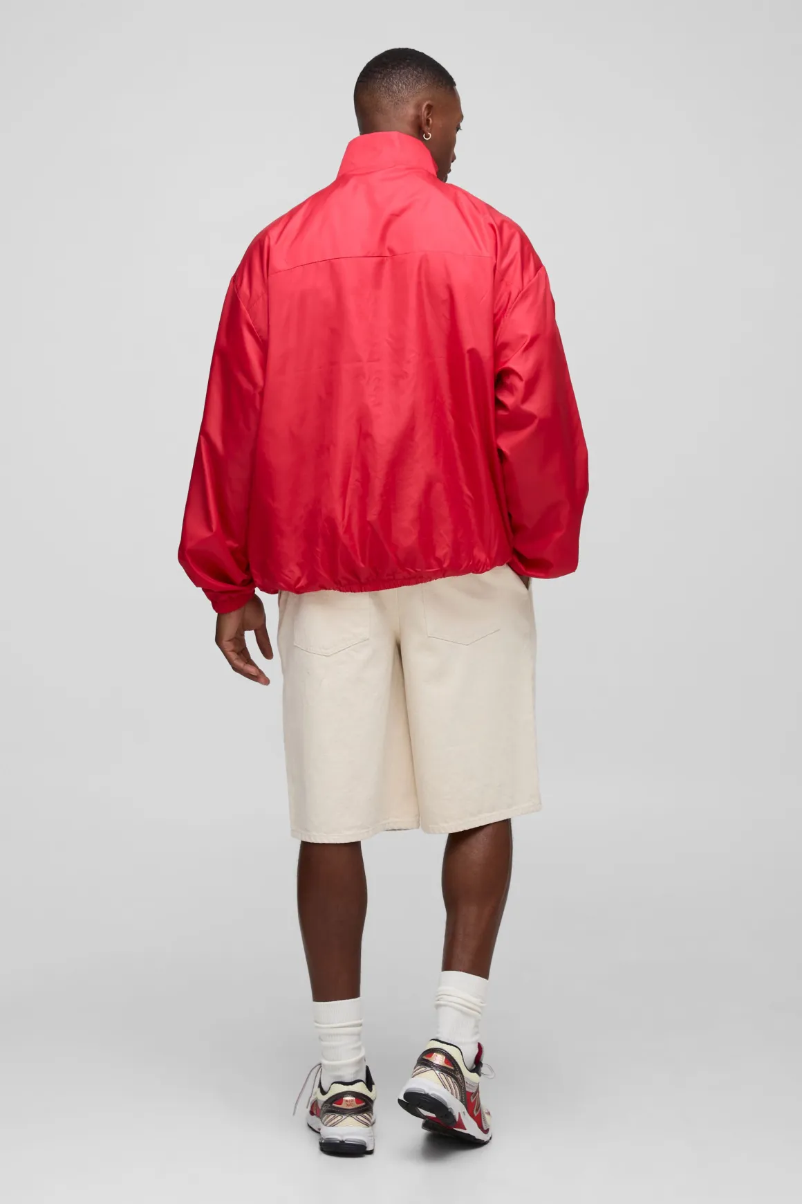 Veste de survêtement oversize à col tunnel haute brillance