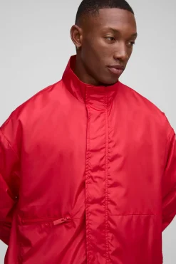 Veste de survêtement oversize à col tunnel haute brillance
