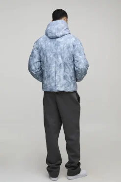 Veste doudoune à capuche en nylon lavé, col entonnoir, coupe ample et allongée