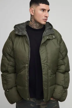 Veste doudoune longue à coupe surdimensionnée, à manches froncées et à panneaux