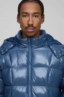 Veste doudoune matelassée à capuche, coupe régulière et finition brillante