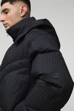 Veste doudoune oversize matelassée abstraite, à col entonnoir, à effet froissé et à capuche