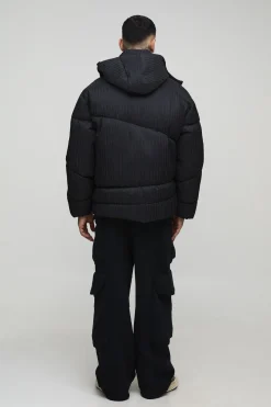 Veste doudoune oversize matelassée abstraite, à col entonnoir, à effet froissé et à capuche