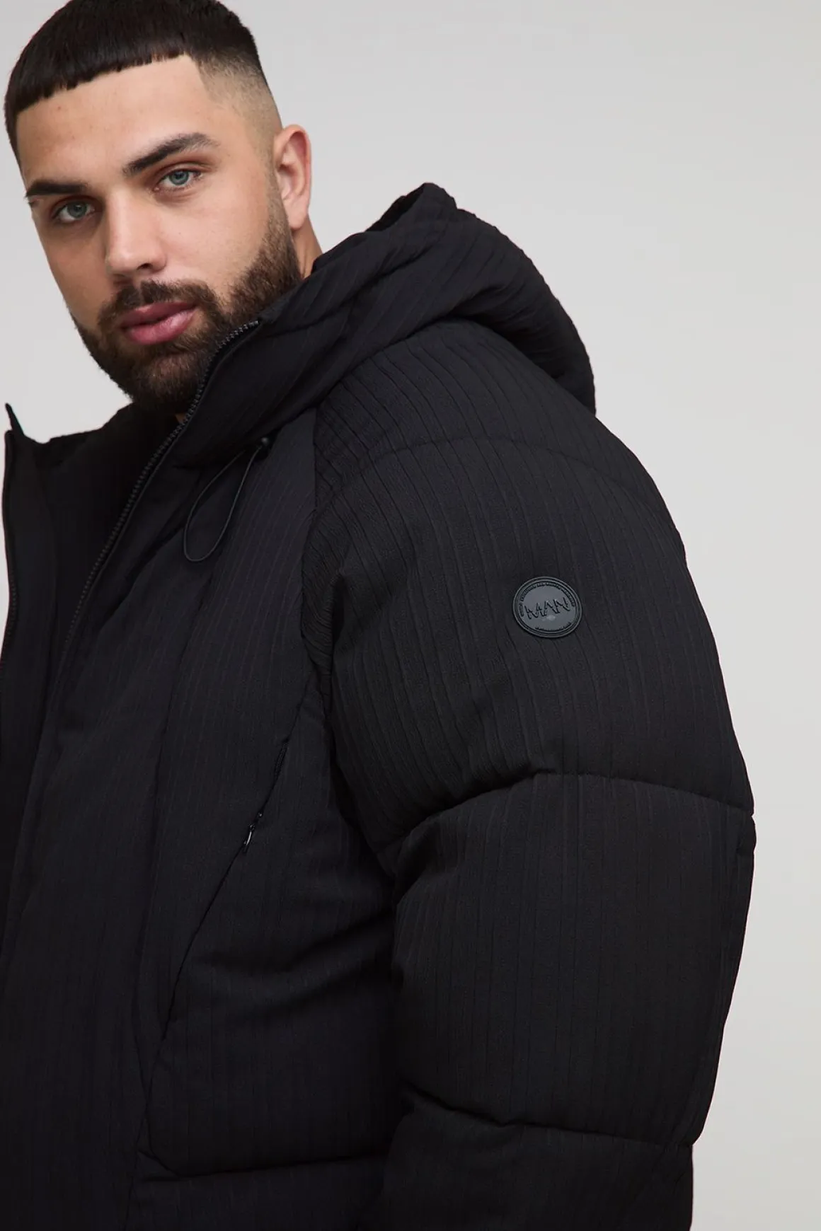 Veste doudoune à panneaux incurvés texturés, coupe régulière Plus