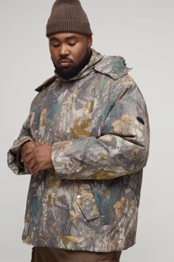 boohooMAN Veste doudoune surdimensionnée camouflage forêt à capuche et col entonnoir<Homme Vestes & Manteaux Grande Taille|Tout Afficher