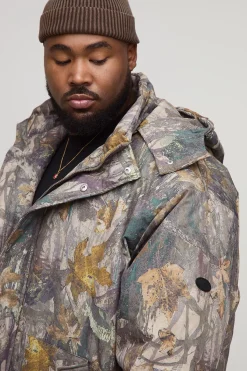 boohooMAN Veste doudoune surdimensionnée camouflage forêt à capuche et col entonnoir<Homme Vestes & Manteaux Grande Taille|Tout Afficher