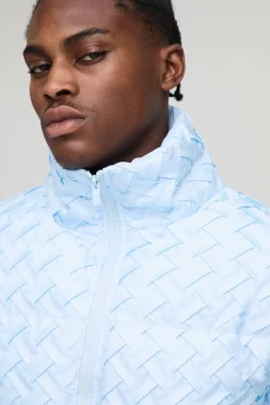 Veste doudoune tissée texturée, col entonnoir, coupe boxy