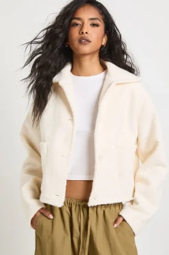 Veste effet laine à col boutonné avec détails de poches
