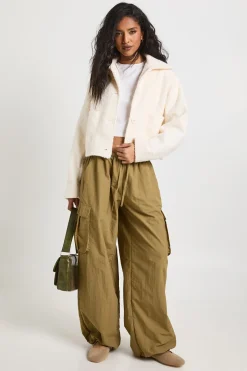 Veste effet laine à col boutonné avec détails de poches