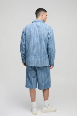 Veste en denim abstrait oversize à patte dissimulée