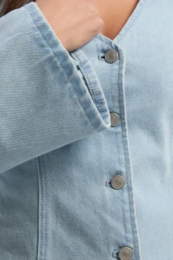 Veste en denim à détails de couture boutonnée