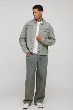 Veste en denim lavé à monogramme, surdimensionnée et à coupe carrée