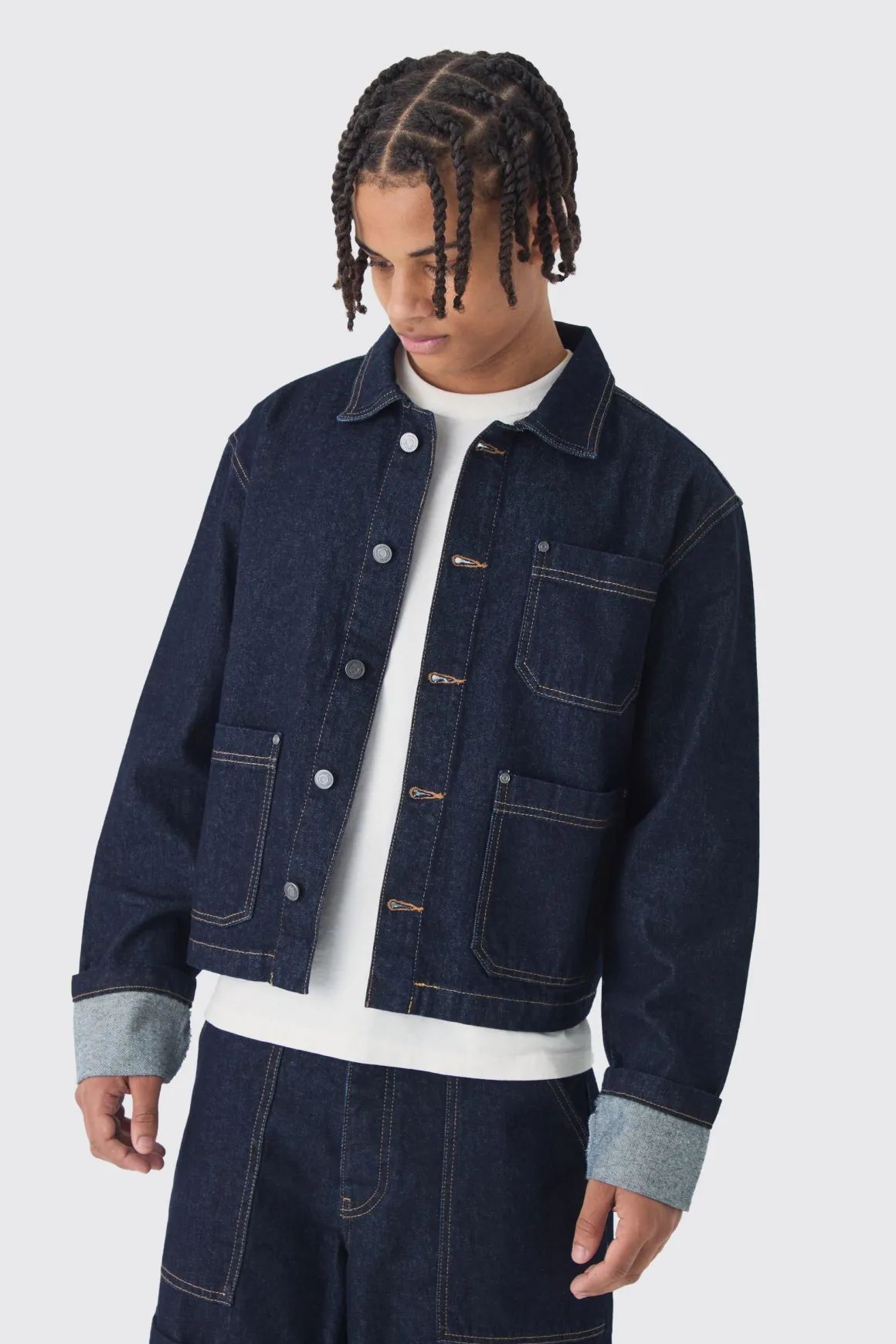 Veste en jean indigo à coupe boxy avec revers