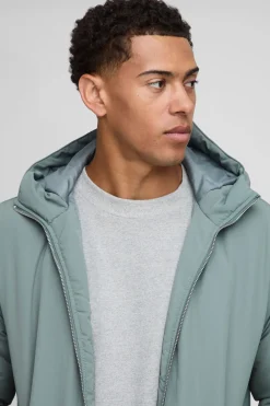 Veste en nylon à capuche, coupe régulière, à texture froissée et finition peached