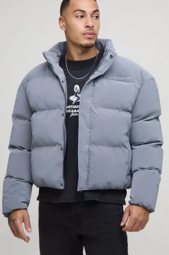 Veste matelassée à col entonnoir, coupe boxy, en synthétique caoutchoutée