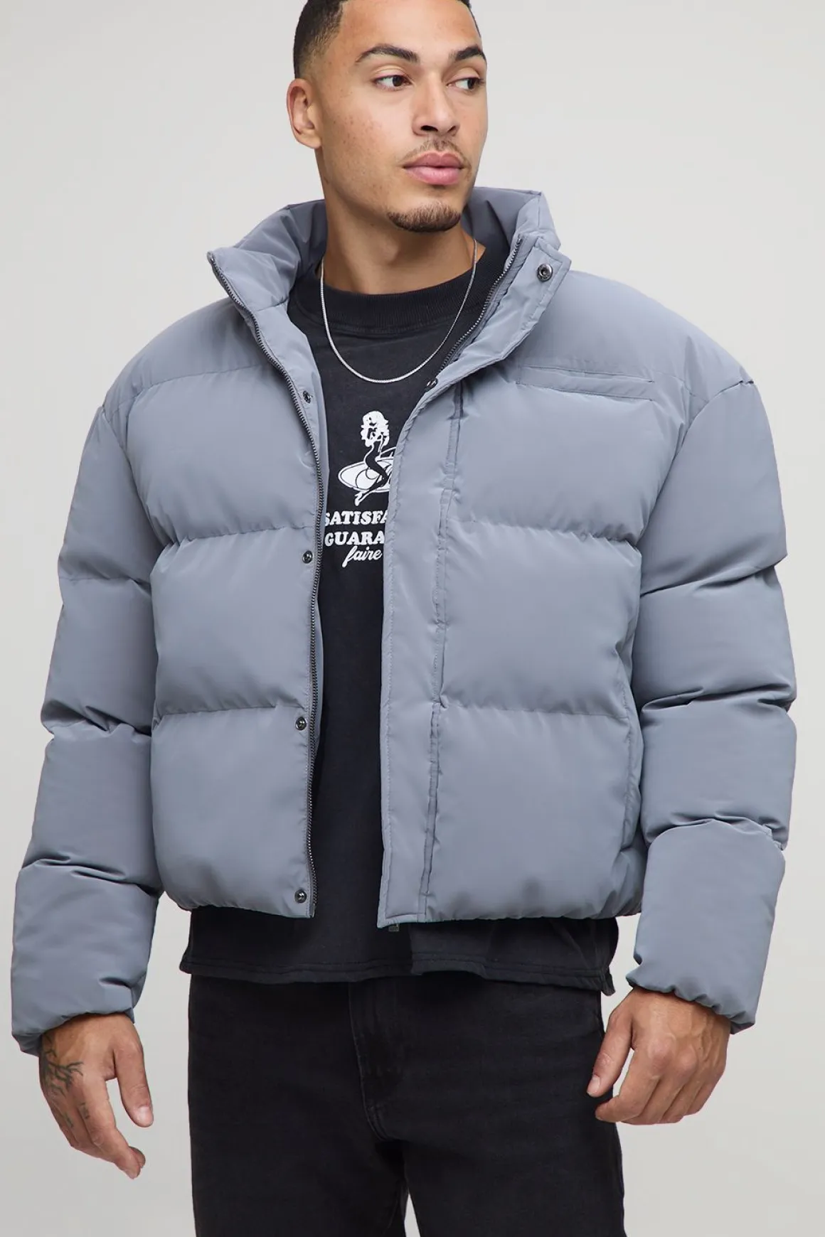 Veste matelassée à col entonnoir, coupe boxy, en synthétique caoutchoutée