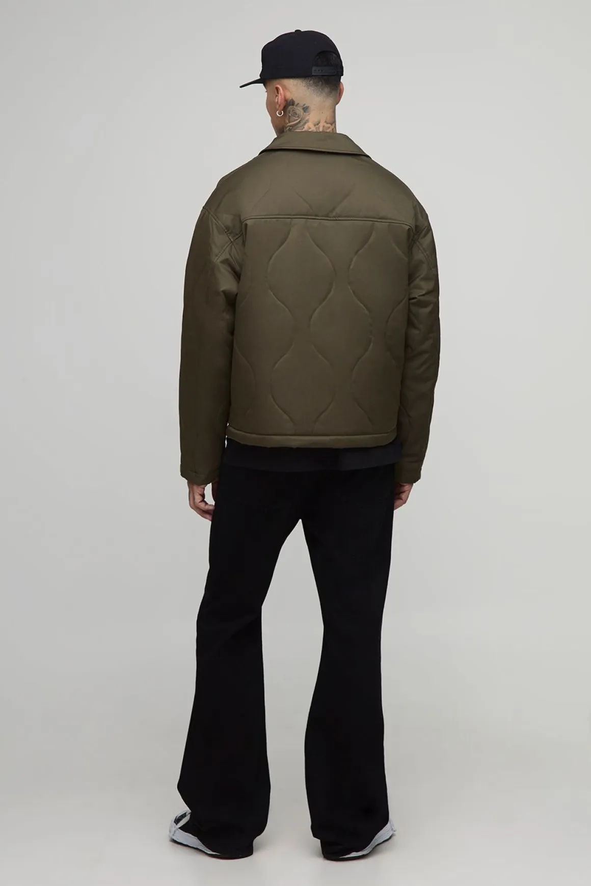 Veste oversize matelassée à col haut en velours côtelé