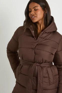 Veste puffer longue à ceinture