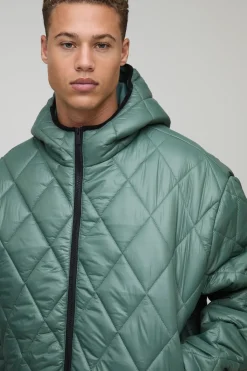 boohooMAN Veste puffer longue, surdimensionnée, au style boxy, à haute brillance, matelassée, à capuche et en coupe entonnoir<Homme Tout Afficher|Vestes & Manteaux Tall