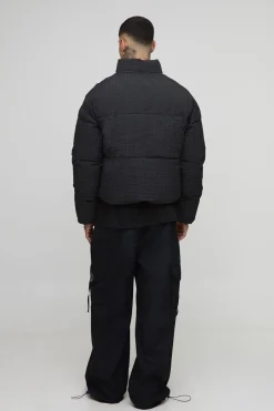 Veste puffer surdimensionnée à carreaux ripstop avec col entonnoir